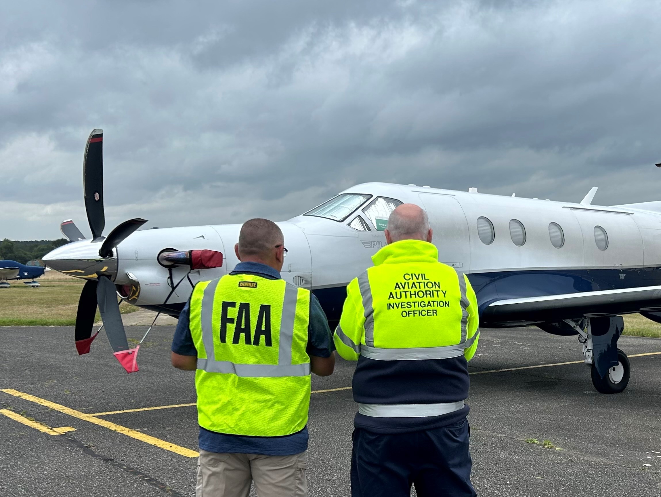 FAA and CAA conducting ramp checks with aircraft in background